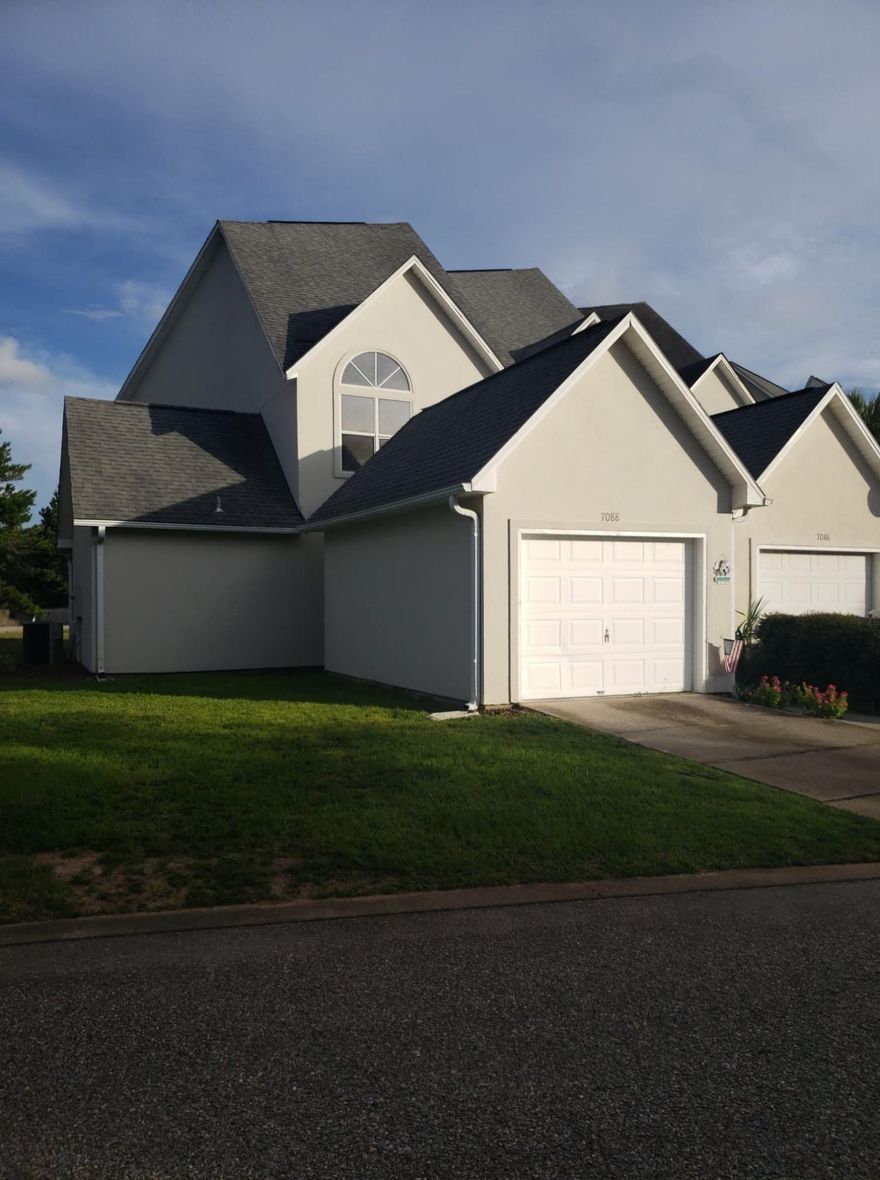 Welcome home to your end unit townhome in a waterfront community. This spacious townhome features 3 bedrooms and 3.5 bathrooms. Each bedroom has their own full bathroom with the additional .5 bathroom downstairs for your quests. Large upstairs master bedroom offers a private balcony, walk in closet and wood flooring. You will find your laundry conveniently located between the master bedroom and one of the additional bedrooms. Downstairs you have a open concept living space with kitchen and living room combined.