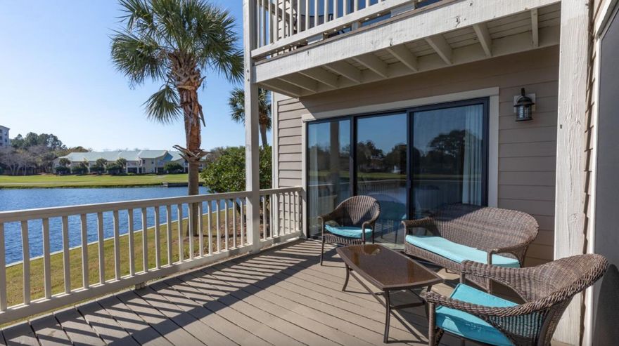 Coastal Charm with Lake and Golf Course Views! 900 Harbour Point is newly decorated in warm coastal style,   this beautiful ground floor,
corner two bedroom, two bath unit is designed in tranquil coastal colors with new wood flooring and a beach chic vibe.  With serene lake views from the living area and outdoor deck, you will enjoy a peaceful setting amidst all the amenities of the resort.  Harbour Point is situated along the Links Golf Course in a tranquil environment with landscaped views of the lake and the Choctawatchee Bay.  The neighborhood swimming pool is steps away and offers an incredible view of the Marina from the pool deck.