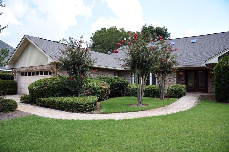 Thoughtfully designed custom home situated on large golf course lot with mature landscaping. Bright light floods this open floor plan through many windows and skylights. Airy spaces for multiple living uses. No expense was spared in the gourmet kitchen complete with Thermador gas stove, Sub Zero refrigerator and Asko dishwasher. The cooking area is located on the large island with bar seating and is open to the dining/living area. What a space for gathering and entertaining! All rooms are spacious with abundant closets and storage. 2 master suites with 2 additional bedrooms sharing a bathroom. The garage is accessed through forth bedroom which is best suited for an office, hobby room, recreation and overflow sleeping. An oversized garage makes space for woodworking.