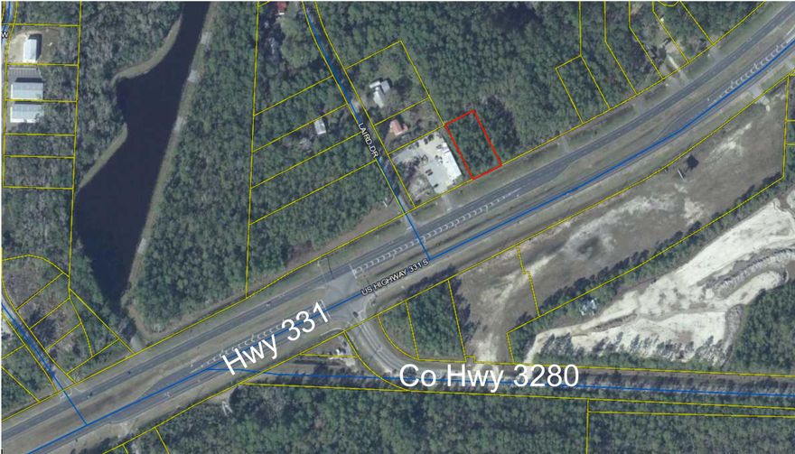 Wooded Lot with 100 ft of frontage Hwy 331 S. Commercial potential, Lot is adjacent to a thriving Pool business, close to the Bay and on a major pathway to the beaches of South Walton.