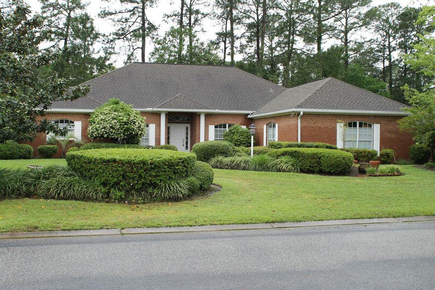 Very Motivated Seller!! Fantastic Custom built all brick home, with open floor plan, constructed by J.P. Hayes located in highly desired Glen Lake subdivision is now available. This beautiful home is located on the Bluewater Bay Lake Course, Hole #9, and is complimented with 3 bedrooms, 3 baths, an office, custom kitchen, formal dining room, large laundry room, inground pool with screen enclosure, and a large lanai. The main living area has sliding glass doors that open up to the lanai. The custom kitchen has a gas range, tons of custom cabinets, island, and a breakfast bar. The very large master suite has two very large walk in closets, large master bath and a separate sitting area that opens up to the pool.