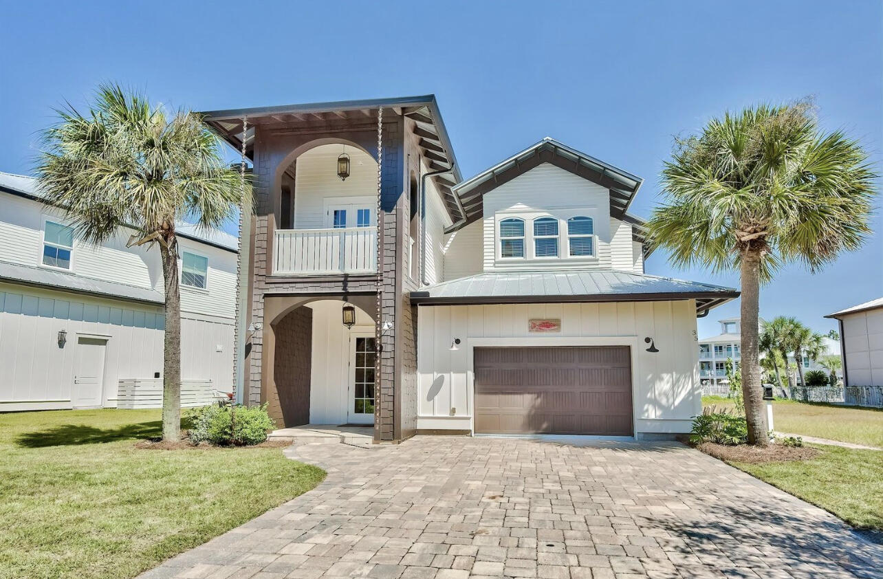 Looking for your dream property. This stunning property sits inside the Beautiful gated community of Cypress Breeze. This 5 Bedroom, 4 and half bath home is a show stopper. Inside you will find hand-troweled Venetian Plaster throughout the main level. This open concept is made for entertaining. Chefs kitchen follows right out into the stunning outdoor space. That is connected to the stunning Cypress Breeze 3 tier rock waterfall pool. This is an investors dream with huge rental projections. Don't miss your chance to own piece of paradise.