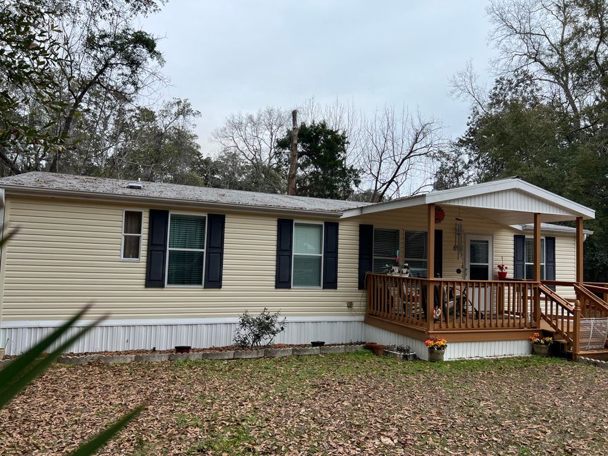 Back on the Market at $10K below appraised value--buyer couldn't obtain financing.  Don't miss this one of a kind property!  This property features a modular home, an older mobile home w/ added living space & a garage/storage building on a large lot with convenient access to Niceville and Freeport.  The primary building is a well-cared for 2009 3/2 mobile home with 1,440 sq ft.  It has an open floor plan with a large kitchen with tons of cabinet and counter space.  The seller chose this model for the wrap-around kitchen!  The older mobile home (1991) conveys as-is with 1396 sq ft but can be a usable living space with minimal improvements. Workshop with attached garage and large carport area.  Buyer to verify any information deemed important to include room dimensions and sq ft