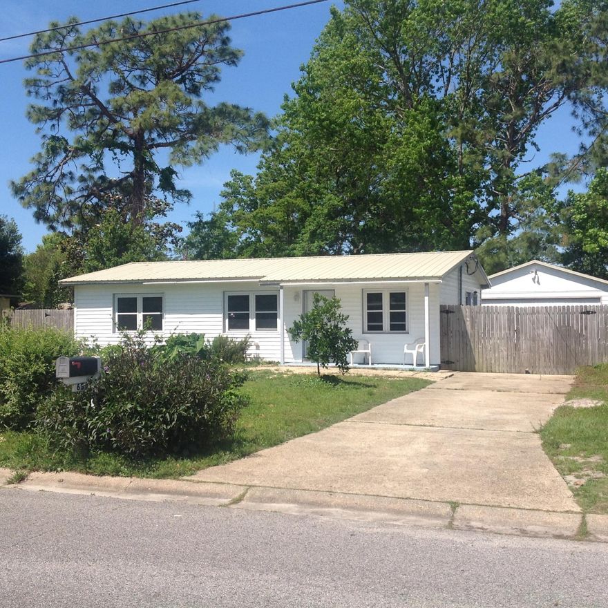 Great Location! In between Eglin and Hurlburt AFB's, schools, shopping, Beaches and park, all close by. 3 bedroom home has SO much to offer! Double paned/double hung windows, complete HVAC system and Lawn pump replaced. plus metal roof on house and garage, all done in recent years. In addition, new electrical panel box, water heater, garbage disposal, and clean out valve installed/replaced Original terrazzo flooring and tile. Over sized, Detached, 2 Car garage with lots of storage. A key pad was installed for easy access. Plywood window covers for additional insurance discount.. Just needs some cosmetic work. Come see this home Today. Great investment and/or home.