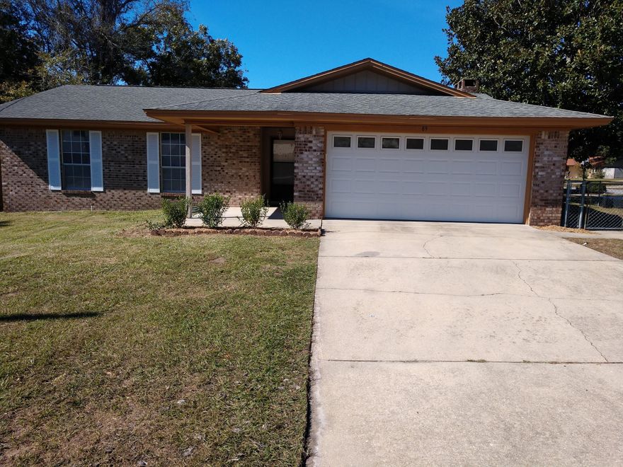 This wonderful home located in Shalimar on a corner lot has several features. An open floor plan with a Florida room. Wood burning brick fireplace makes a nice focal point and can be enjoyed from the kitchen, dining and living areas. There is a nice size walk-in closet in the hall that could be a pantry, linen closet or just additional storage. The master bedroom features a walk-in closet and it's own bathroom. The garage is a good size with a door opener. With a corner lot convenient to Eglin Air Force Base.
