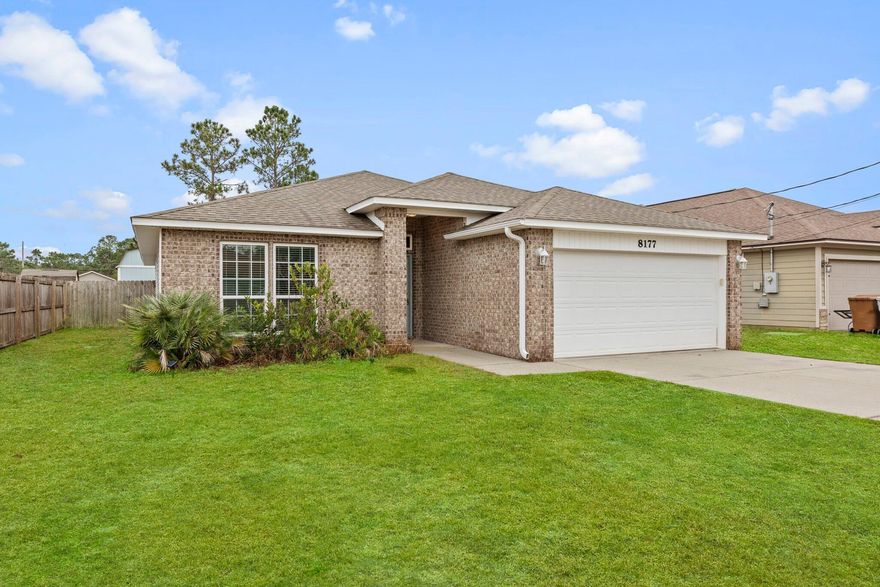 Welcome to this beautiful 3-bedroom, 2-bathroom home located in desirable Navarre, FL. This home offers a modern and stylish living experience with its stunning granite countertops and sleek stainless steel appliances. The spacious and open floor plan is enhanced by the luxurious LVP flooring, providing a contemporary and low-maintenance living space. Step outside onto the covered patio and enjoy the fresh air while taking in the serene surroundings. Additionally, this home offers the convenience of an outdoor storage shed, perfect for storing your belongings. With its prime location and desirable amenities, this home is sure to provide a comfortable and enjoyable living experience. Don't miss out on the opportunity to make this house your home.