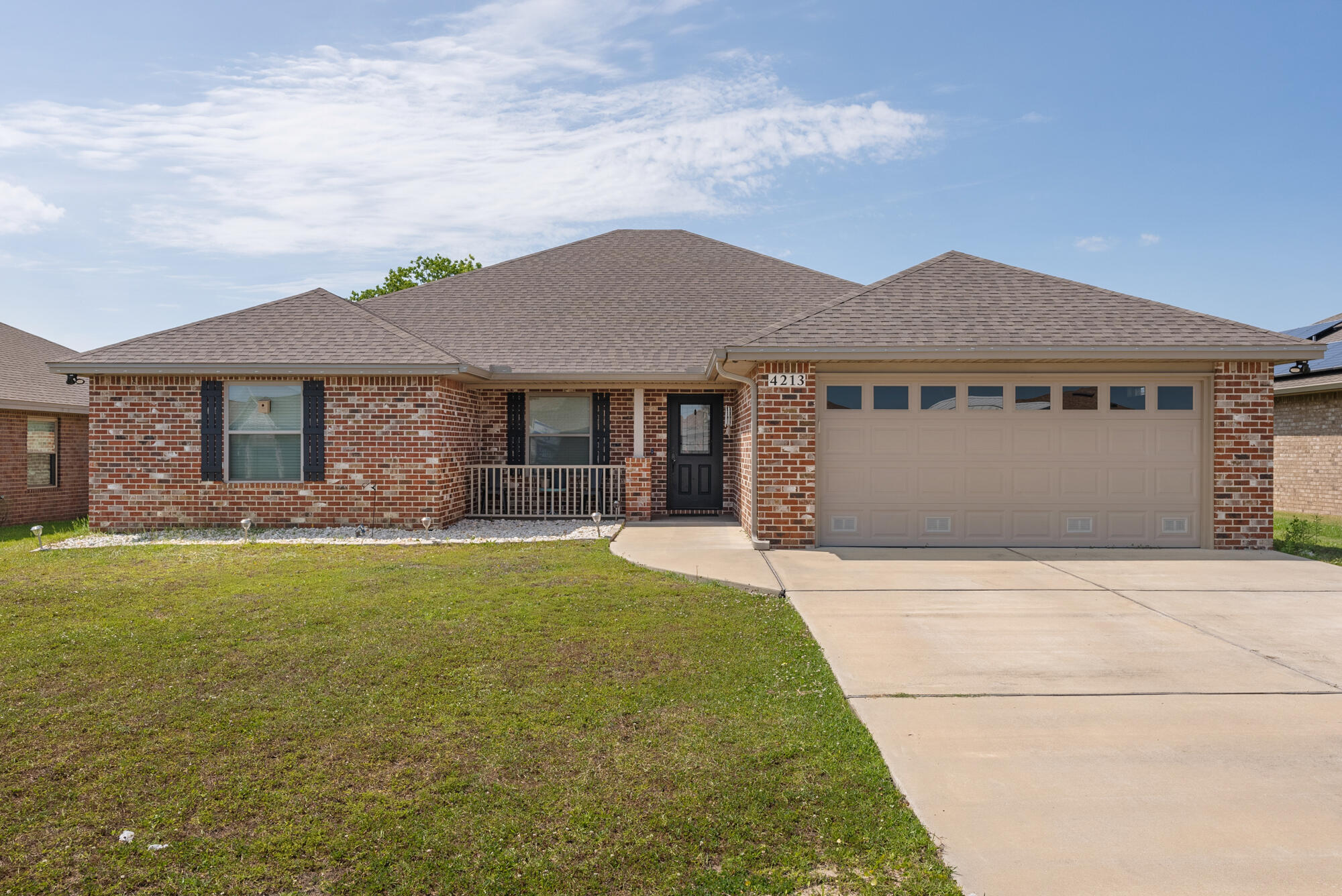 2.3% assumable interest rate. Step into Bylsma Manor Estates, where luxury meets comfort in this exceptional 4 bedroom, 2 bathroom all-brick home. With a floor plan that sets it apart from the rest, this residence sits on a spacious lot, offering privacy with no neighbors behind. As you step inside, you're greeted by a sprawling open floor plan adorned with luxurious wood flooring in the main living areas, plush carpeting in the bedrooms, and tile in the bathrooms.The heart of the home, the kitchen, is a chef's dream, boasting real wood cabinets, stunning granite countertops, and sleek stainless steel appliances. Indulge in the opulent master suite, featuring a generously-sized bedroom with built-in rope lighting, a sprawling walk-in closet, and a master bath equipped with a luxurious double shower, complete with a rainmaker and three shower heads, along with a convenient shower seat and double vanity.
Entertain guests in the spacious living room, which boasts soaring ceilings, an electric fireplace, crown molding, and state of the art entertainment wiring. Step outdoors to enjoy both covered and open back porches, ideal for relaxation and gathering with loved ones. Additional features include an outdoor shower, sprinkler system, security system, and a generator-ready electrical outlet with cord.
Don't miss the chance to call this remarkable property your new home. Plus, with an assumable loan option at a favorable 2.3% interest rate, the possibilities are endless for making your homeownership dreams a reality