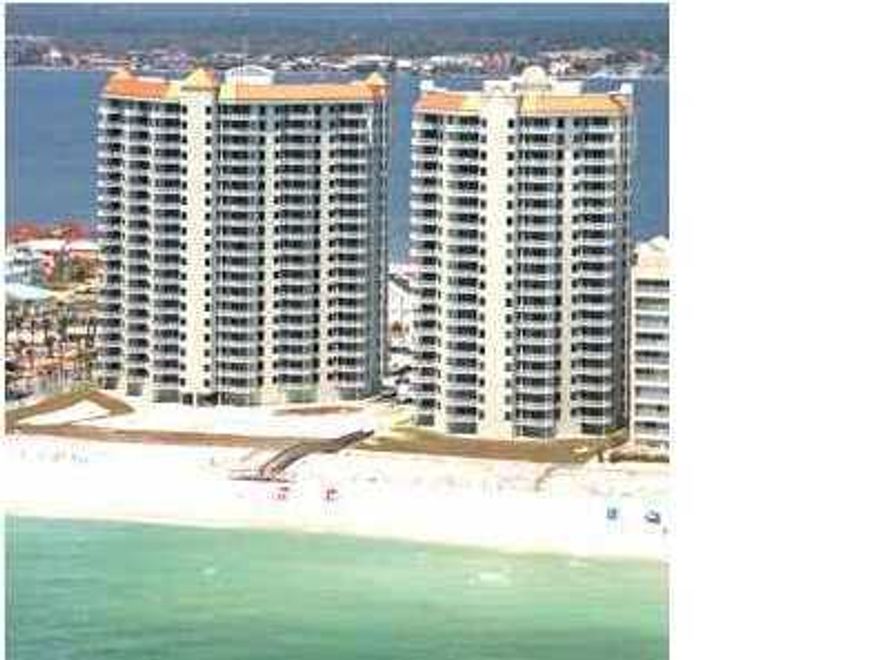 ***REO*** This property is bank owned and is being sold ''As Is'' condition without repairs or warranty. Buyer is responsible for verifying all information contained in this listing. This 3br/3ba condo has spectacular views from every window. So if you love Navarre Beach there is no comparison to the trendsetting architecture, the spaciousness, the privacy and the mulitiple exposures to the gulf. With it's private entry ways, circular terraces which are outdoor rooms and Master Bath spas on the Gulf create a setting everyone dreamms of. Amenities include Covered parking, Olympic size swimming pool, Clay tennis courts, Fitness room and Social center with a full kitchen for parties and entertaining. Security cameras and coded elevators. Hurry this is a must see!
