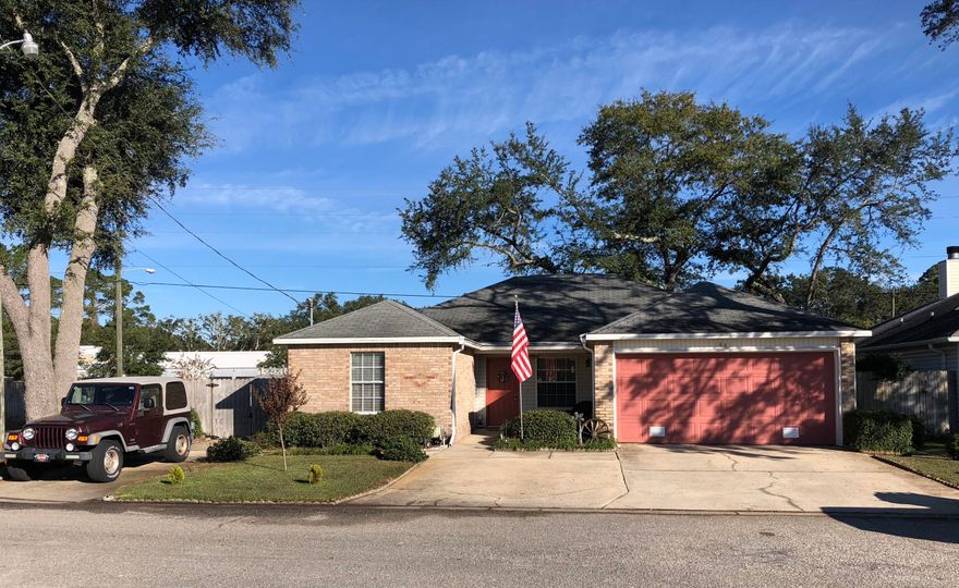 You'll love this charming, newly painted brick home that is 2 minutes away from Hurlburt's back gate and 8 minutes away from Eglin's front gate! This 3-bedroom,2 bathroom home with a huge 2-car garage will give you 1,600+ sq ft of generous space to move about without losing that quaint, cozy atmosphere when it's time to cuddle up to watch a movie in your large living room with trey ceilings! Wake up each morning and enjoy your coffee in the heated/cooled Florida-Room/Sun porch! Open your front door and enter your spacious open-living room. The large dining room will seat your whole family. The kitchen can double as an 'eat-in kitchen'. A luxuriously spacious master bedroom has a dressing area and a large tiled bathroom w/ a steamy walk-in shower! 2 more large bedrooms + so much more!