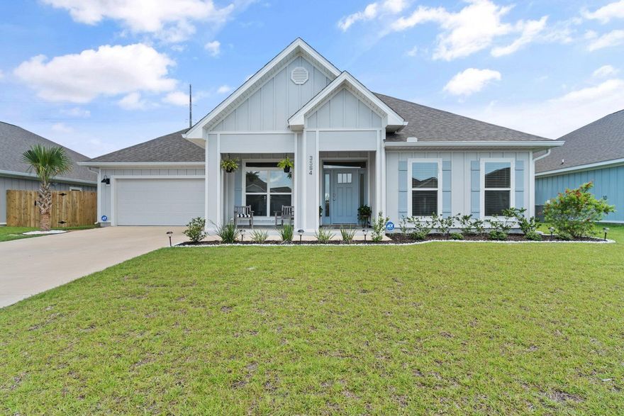Better than new home in Gulf Breeze! This home has had several upgrades since purchased, such as beautiful tile backsplash in the kitchen, custom electric fireplace enclosure, gutters wrapping the entire home, along with fencing. This 5 bedroom, 3 bath home boasts 3,100+ sq ft and sits on one of the largest lots in the community. The home features an amazing open floor plan with a formal dining room and great flex space that would make the perfect home office. This fantastic home is ideally located just 10 minutes from the white sandy beaches of Pensacola Beach, only minutes from Walmart and Publix, and in one of the highest rated school districts in Santa Rosa and Escambia Counties. This is surely a home you don't want to pass up!