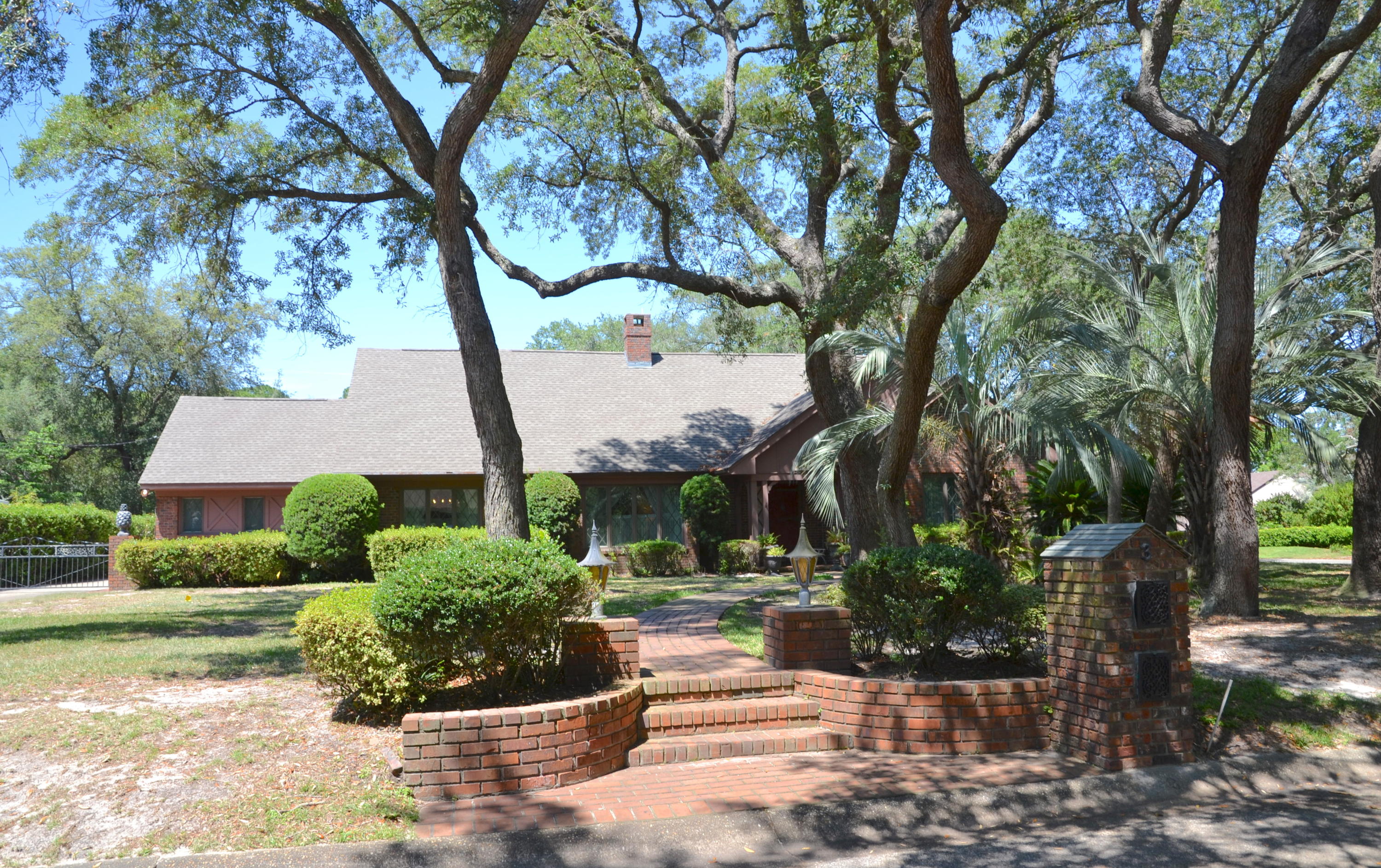 What a find in Lake Lorraine with a POOL and 26 x 19 Screened Porch! Make this your dream home TODAY! The owner has completed major updates with windows, HVAC systems, and hot water heaters. 4 Bedrooms, 3 Full Bathrooms, TWO Living Areas, Workshop, and all the CHARM you have been looking for in a home. Corner Lot has many MATURE shade trees, a brick paver sidewalk entry, wrought iron gate and a rear entry attached 2 car garage. The Workshop is perfect for all of your tools and projects. Step into the Tiled Foyer with the Formal Living Room to the Left. Formal Dining Room is located next to the Formal Living Room and off the Kitchen. Utility Room is located off the Kitchen and next to the Garage. Utility Room has space for an additional range and refrigerator. Breakfast Nook in Kitchen