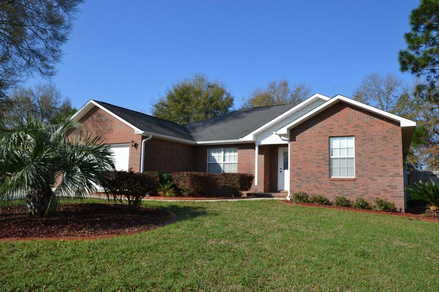 READY FOR THE NEW OWNER! All Brick, Split Bedroom, OPEN-Concept Floor Plan w/4 Bedrooms! Conveniently located off Hwy 90 West. Freshly Painted; NEW Hardware and Fixtures throughout; NEW Hardwood floor in living, dining, and hallway areas; NEW Carpet in all bedrooms; NEW Lighting in Kitchen, Dining, Foyer, and Hallway; ALL completed in 2014/2015. 1 Year HOME WARRANTY provided & Most of your CLOSING COSTS are paid for. UPDATED Countertops with high end Epoxy finish that have the look of granite in the Kitchen and Master Bathroom! You have to see the quality of these countertops! Ceramic Tile in the Kitchen, Bathrooms, and Laundry Room. Kitchen comes fully equipped with all Appliances, Pantry, Stone Backsplash, & Breakfast Bar.