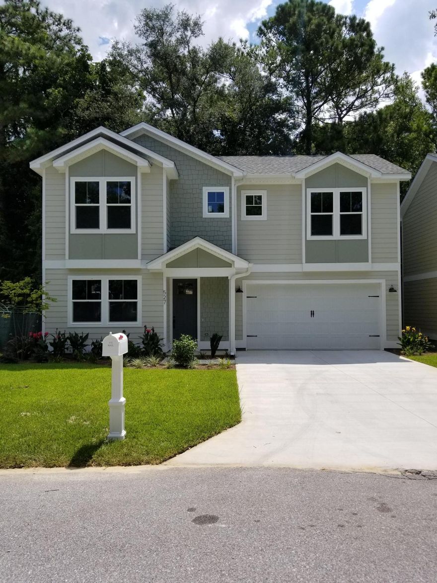 MOVE IN READY + NEW PRICE + $8K TOWARDS CLOSING COSTS ON THIS BRAND-NEW CONSTRUCTION HOME constructed by a local Veteran Owned General Contracting Company. This 3-bedroom, 2.5 bath home located on a quiet cul-de-sac in the heart of Niceville, Florida is centrally located near top rated schools, shopping, banking, & dining. Just minutes from the white sandy beaches of the Emerald Coast as well as Eglin AFB. 2-story home featuring HardiePlank Cement siding sits on a high & dry lot with a view of a beautiful creek and a wetland preserve from your back deck. A well thought out floor plan with black stainless-steel appliances, porcelain marble bathrooms, white Carrara Quartz countertops, custom cabinetry in the kitchen, all bathrooms, & the upstairs laundry room. Builder 2-10 Warranty included