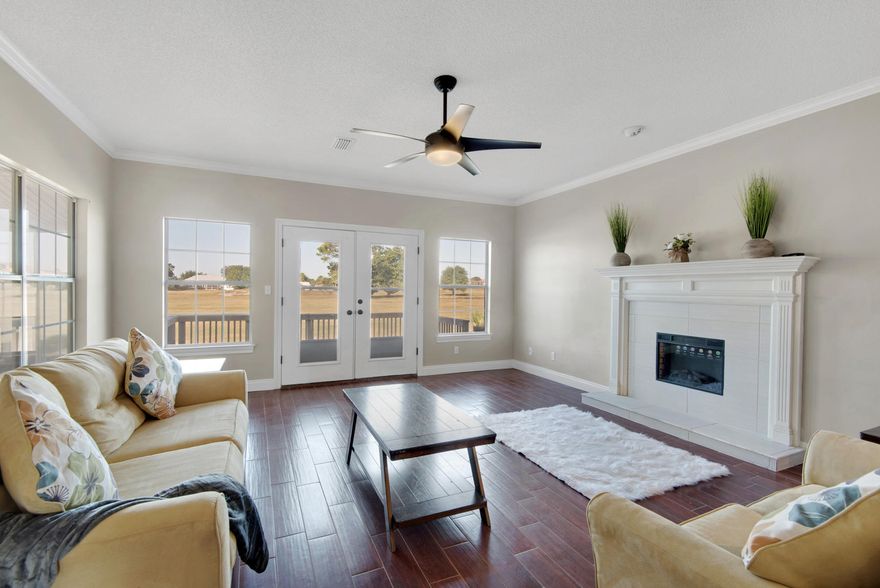 WATERFRONT at Tiger Point Golf Course! Remodeled 3/2.5 Home in a sought after neighborhood with breathtaking views. The remodeled kitchen has new cabinets, granite countertops, stainless steel appliances, and light fixtures. An upscale electric fireplace is the focal point of the living room. Beautiful views of the water and golf course can be seen from the living areas and bedrooms. The master bedroom on the first floor opens up to a screened in patio where you can enjoy the view of the water, the sound and putting green. There is a connected deck where you can entertain your guests and fire up the bbq. The master bath has dual vanities, a garden tub and separate shower. New flooring and fixtures. There are two bedrooms upstairs and a full bath.