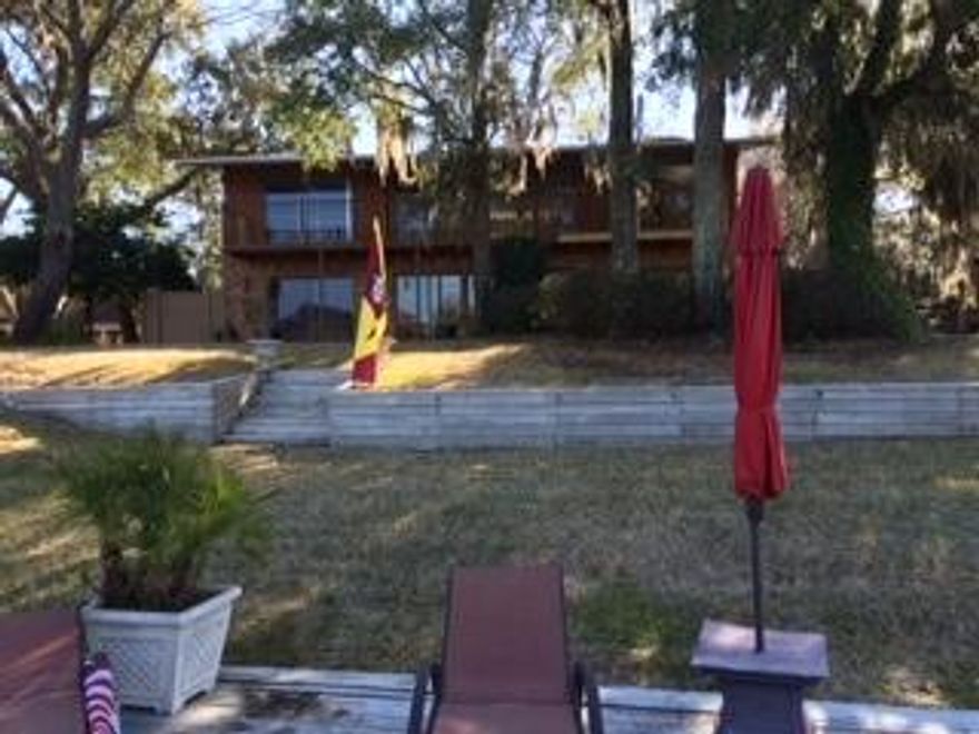 Beautiful waterfront property on Cinco Bayou. Includes seawall, dock, boat lift, jet ski lifts. An extra room could be used as a 4th bedroom. Loft area at top of the stairs.