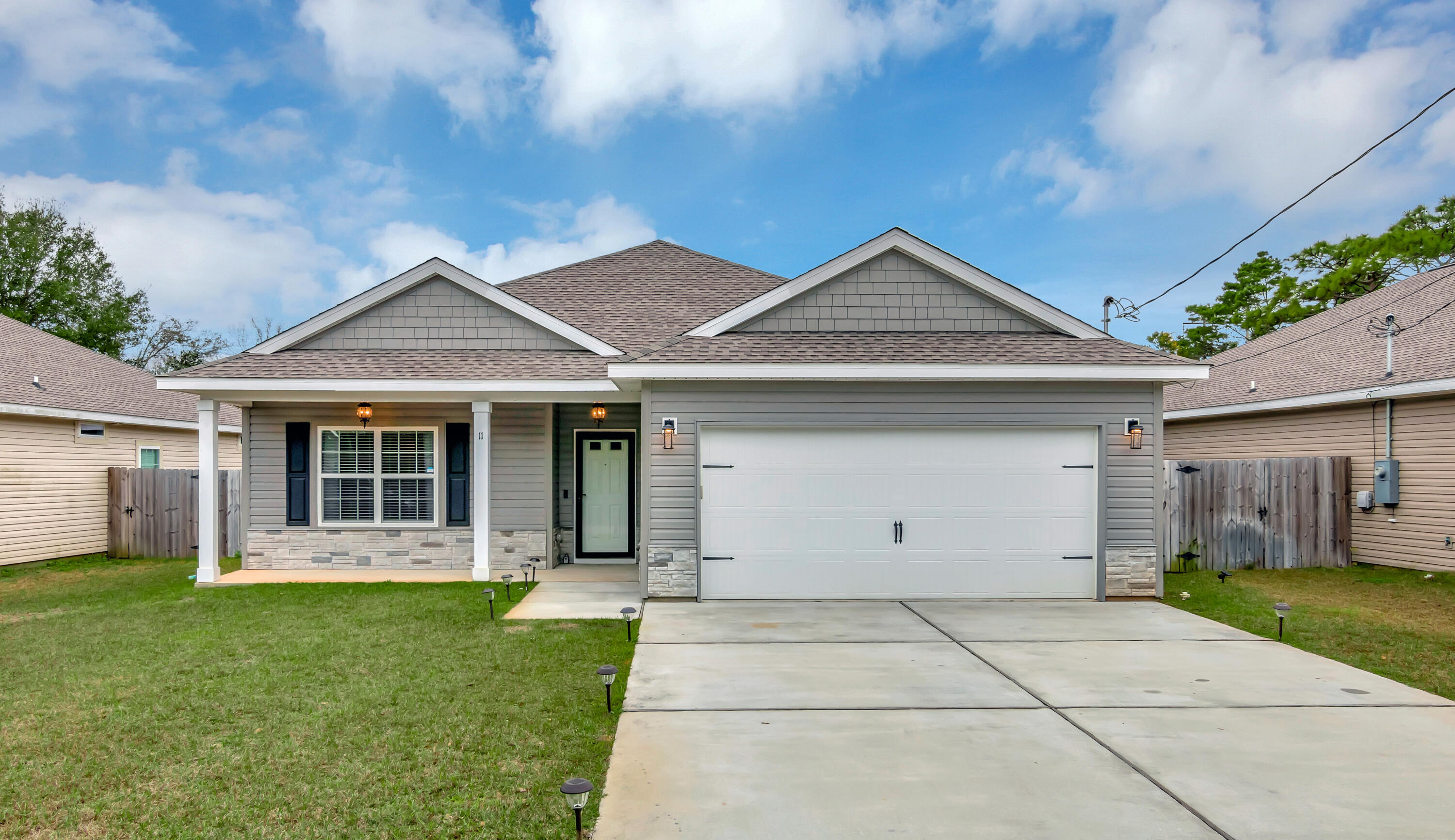 Is this your new home? Come take a look! Located within Crescent Shores, this craftsman style 3 bedroom, 2 bathroom home is perfectly positioned in Mary Esther. The property is conveniently close to Hurlburt AFB, schools, shopping and our beautiful beaches. The home has been very well maintained, and features architecturally distinct gables with hardie shakes along with a classic front porch, rich vinyl flooring throughout, 10ft ceilings, an open kitchen with Samsung stainless steel appliances, spacious bedrooms, epoxy garage flooring and a fenced in backyard just to name a few. This home is a must see. Contact me today to schedule your private showing!