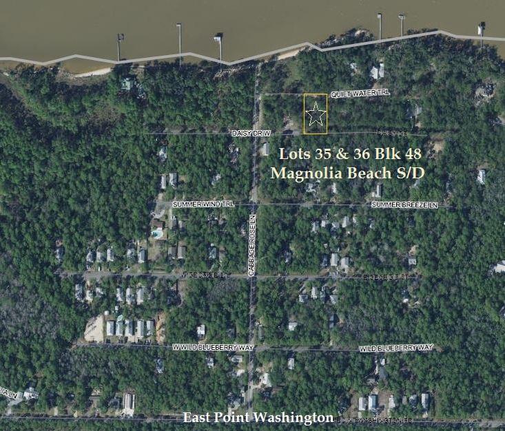 Great double lot in a secluded neighborhood located in Point Washington. Lot sits between Quiet Water Trail and East Daisy Drive. Community Bay access at the end of Cabbage Rose Lane.