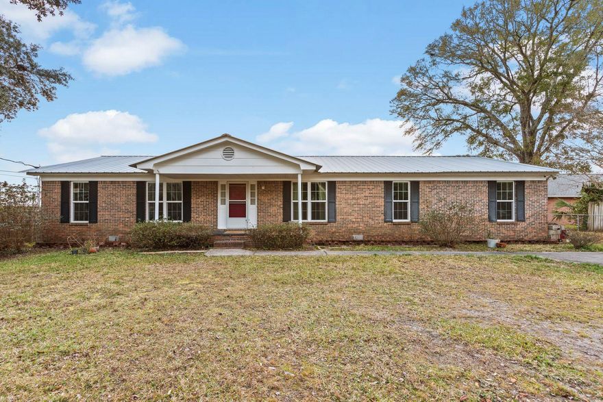 Welcome to 122 Beach Drive, a one-of-a-kind Florida ranch style home! This property has it all, featuring a double lot with access from both front and back roads, additional parking perfect for that boat or RV, a metal roof, and a large 2.5 car garage. The interior is spacious and flows seamlessly throughout. Upon entering, the oversized living room is located in the center of the home, and offers plenty of space to spread out and relax. To the left, the primary suite offers 2 closets and an ensuite bathroom, with an additional 2 bedrooms and full bathroom just down the hall. The opposite side of the home features an office/ flex space, large kitchen, formal dining room, interior laundry room, and half bathroom. The kitchen has been expanded and updated, providing a large island and an abundance of cabinets and counter space, perfect for large families or entertainment. This home, located in the heart of Fort Walton Beach, is convenient to shopping/dining, military bases, and our beautiful Emerald Coast Beaches. It's priced to sell and truly a must see! 