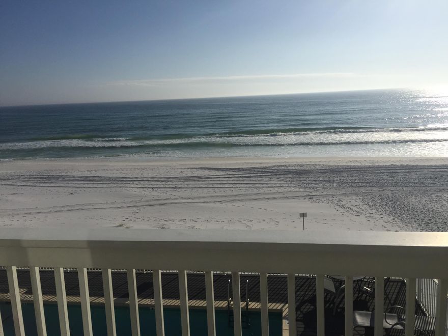 GULF FRONT on 30A for under $1M! You must see this beautifully remodeled gulf front townhome offering incredible views from the kitchen, dining, living area, screen porch, master bedroom, and open balcony. On the first floor there is an open concept kitchen with granite counter tops and stainless steel appliances; a large living and dining area; laundry and half bath; and a screen porch for enjoying the sounds and breeze of the ocean. Upstairs there are three bedrooms and two bathrooms. Wake-up to the sights and sounds of the ocean in the large master bedroom with a full width private balcony, overlooking the Gulf of Mexico. Step out the back door for quick access to the white sandy beaches of South Walton or the community gulf front pool. All information should be verified.