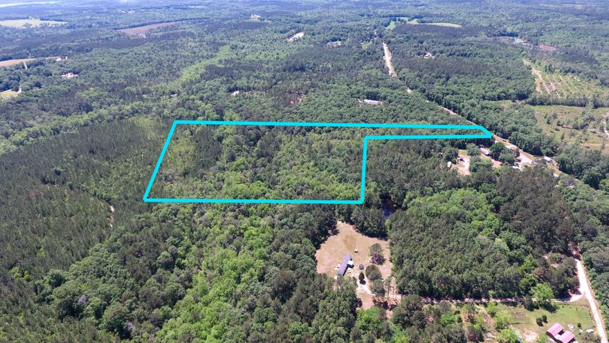 This beautiful 12.5-acre parcel is in a great location in North Walton. It is a 15-minute drive from downtown DeFuniak Springs. Large oaks, cedars, and magnolias cover this property—the property fronts County Hwy 183-B. The pavement provides access, and power is available on the road. The deeded access takes you to the rear of the lot; it is forty-five feet wide and four hundred fifty feet long, opening to a large parcel. What a fantastic opportunity to create a private drive into your well-planned home site.  Single-family residences or mobile homes are welcome.  It is currently used for hunting, so please call Keri at 850 -789-8599 before entering the property.   Interested parties should perform due diligence to verify information, measurements, and all pertinent information.