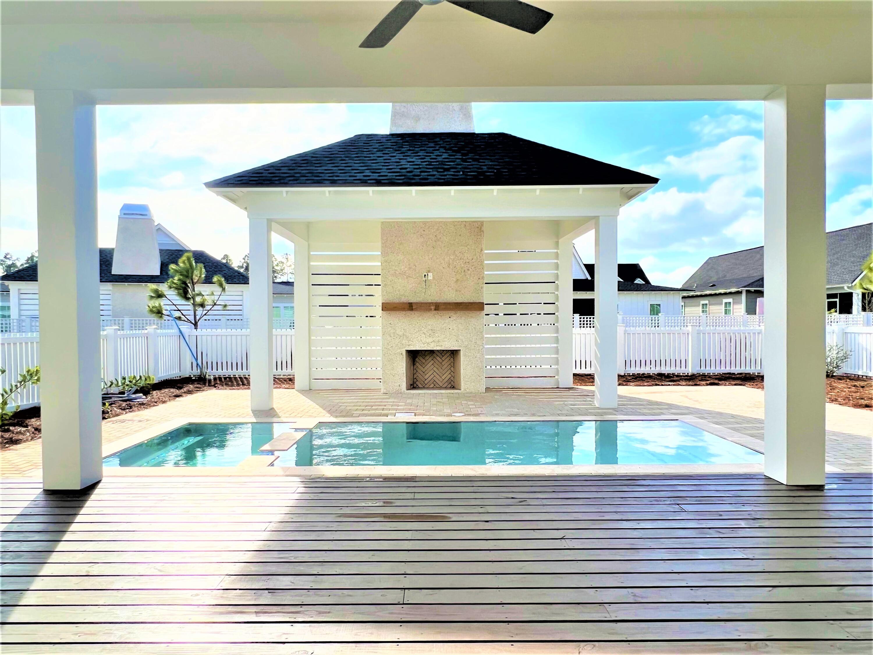 BRAND NEW and available immediately!  This sought after Suffolk plan offers 3087 sq ft, 4 Bedrooms, 4.5 bathrooms, 2-car garage & a HUGE bonus room. Perfect for entertaining, the spacious great room opens up to the outside with private pool/spa with 16' sliding glass doors. Luxury features include quartz countertops in kitchen, marble countertops in bathrooms, soft close cabinets and drawers, solid core doors, gas lantern on porch, and Thermador/Bosch appliances including a 36'' dual fuel Thermador range. Flooring includes engineered hardwood flooring plus porcelain tile in master-bath shower and other bathrooms. The Watersound Origins community is a wonderful neighborhood full of amenities including the Village Commons pool & fitness center, sports courts, miles of nature trails,