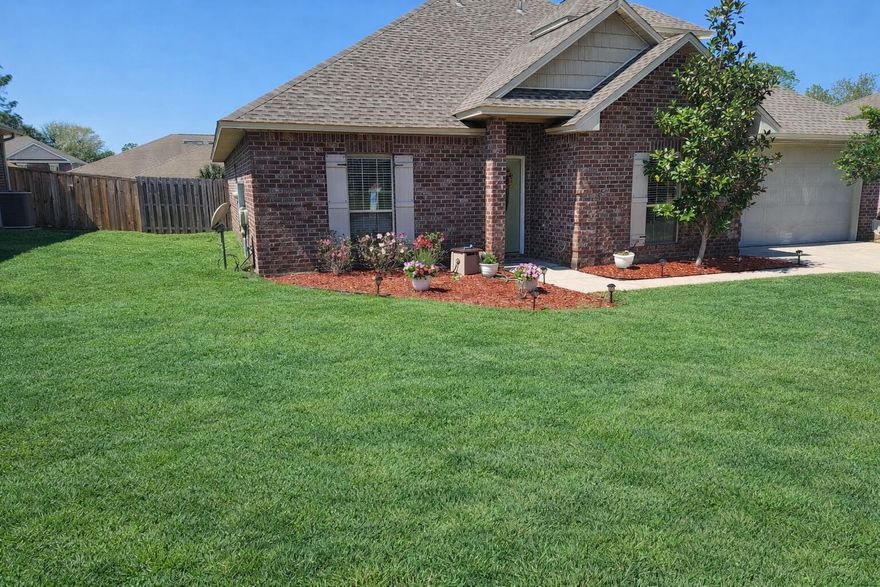 LOCATION, LOCATION, LOCATION!  Positioned south of I-10 in one of Crestview's most convenient and commuter-friendly areas, this large all-brick home offers exceptional access to the 7th Special Forces Group, Duke Field, Eglin AFB, Hurlburt Field, shopping, dining, and the white-sand beaches of the Emerald Coast. The interior features an open and functional floor plan with laminate wood flooring throughout the main living areas and neutral finishes. The spacious kitchen has granite countertops, stainless steel appliances, crown molding, a butcher-block island, and ample cabinetry, making it ideal for both everyday living and entertaining. The main-level primary suite offers a private retreat with a large walk-in closet, double vanity, garden tub, and a walk-in granite shower.  Secondary bedrooms are generously sized and provide flexibility for family, guests, or home office use. Upstairs, a large bonus living area with its own full bath adds exceptional versatility and can easily serve as a media room, guest suite, playroom, or additional living quarters. Outdoor enjoyment is enhanced by a privacy-fenced backyard and patio area, perfect for relaxing or hosting gatherings. Major system updates provide added peace of mind, including a newer roof installed in March 2022, a new HVAC system in April 2025, and a new water heater installed in January 2026. This well-located and move-in-ready home offers space, functionality, and convenience in one of Crestview's most established communities.