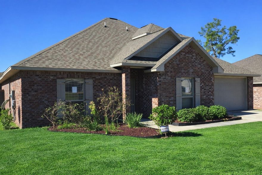 LOCATION, LOCATION, LOCATION!  Positioned south of I-10 in one of Crestview's most convenient and commuter-friendly areas, this large all-brick home offers exceptional access to the 7th Special Forces Group, Duke Field, Eglin AFB, Hurlburt Field, shopping, dining, and the white-sand beaches of the Emerald Coast. The interior features an open and functional floor plan with laminate wood flooring throughout the main living areas and neutral finishes. The spacious kitchen has granite countertops, stainless steel appliances, crown molding, a butcher-block island, and ample cabinetry, making it ideal for both everyday living and entertaining. The main-level primary suite offers a private retreat with a large walk-in closet, double vanity, garden tub, and a walk-in granite shower.  Secondary bedrooms are generously sized and provide flexibility for family, guests, or home office use. Upstairs, a large bonus living area with its own full bath adds exceptional versatility and can easily serve as a media room, guest suite, playroom, or additional living quarters. Outdoor enjoyment is enhanced by a privacy-fenced backyard and patio area, perfect for relaxing or hosting gatherings. Major system updates provide added peace of mind, including a newer roof installed in March 2022, a new HVAC system in April 2025, and a new water heater installed in January 2026. This well-located and move-in-ready home offers space, functionality, and convenience in one of Crestview's most established communities.