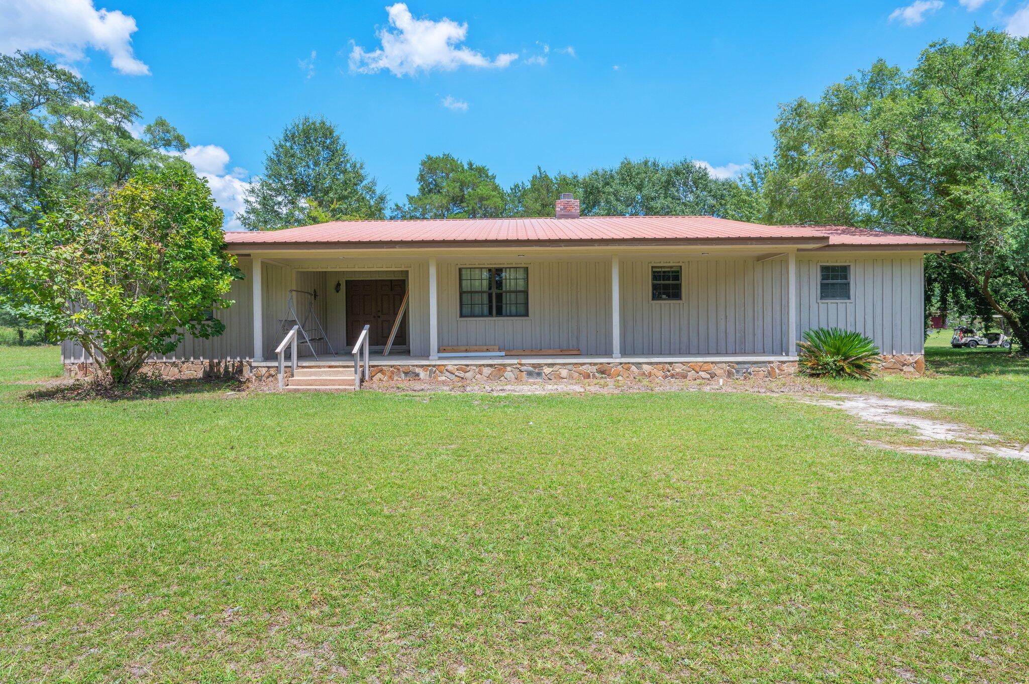 This spacious 3-bedroom, 2-bathroom home offers 2,936 square feet of living space on a beautiful 1.25-acre lot with a peaceful pond view. Featuring multiple living areas, oversized bedrooms, and a generous kitchen, the home provides both comfort and room to spread out. Located just minutes from town, it offers the perfect blend of privacy and convenience. Rental requirements include a minimum credit score of 600, verifiable monthly income of at least 2.5 times the rent, and completion of background and credit checks. First month's rent and security deposit are due at lease signing. No smoking allowed. Pets may be considered with approval and a non-refundable pet fee.