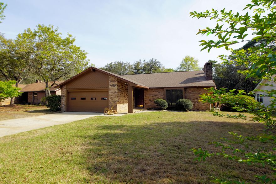 Great location, this 3/2 home is centrally located in Bluewater Bay. Move-in ready needing some TLC. Recent kitchen upgrade with new granite counters, freshly painted cabinets, new kitchen/dining laminate flooring with stainless appliances. Living room is large, light and bright with a fireplace. Master Bedroom includes a 9'x9' sitting area. Home has new Trane HVAC, front loading washer and dryer, Nest thermostat and Ring door bell. Backyard is fenced and home backs up to a nature trail. Bluewater Bay has golf, tennis, swimming pools, restaurants, full service marina, A+ schools and is close to Eglin AFB and the beautiful beaches of Destin.