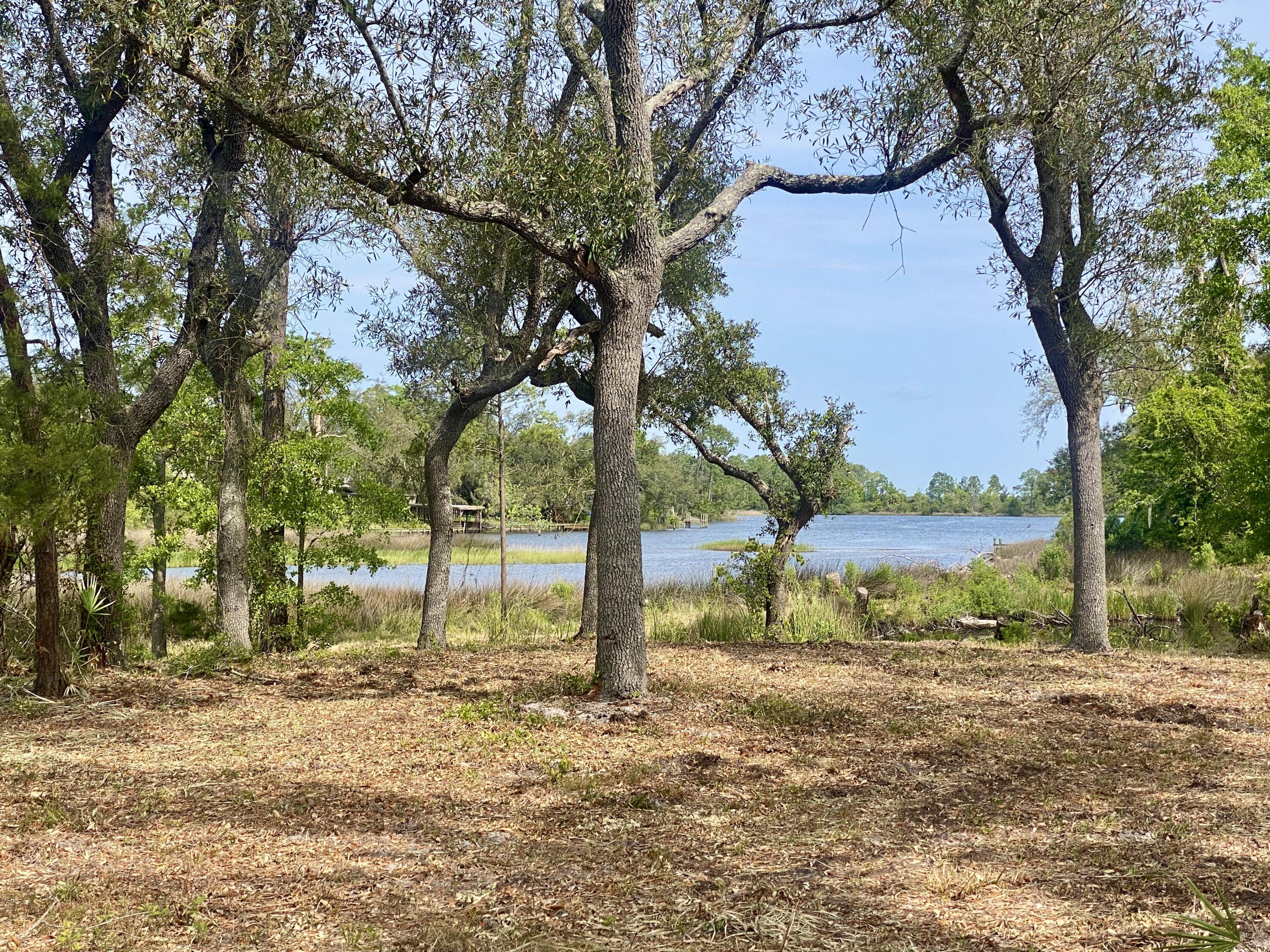 Priced to sell!! This huge waterfront property has 350' of water frontage on Lynn Haven Bayou. Build your dream home here and enjoy magnificent sunsets, fishing and water sports right from your backyard. This lot is approximately 1.5 acres and can accommodate 3 homes. There are also two ponds on the property; install a water fountain to create a serene oasis. Shopping and schools are conveniently located as well as Tyndall AFB (16 miles), Hospitals (3.8 miles), St. Andrew State Park (15 miles), and Pier Park (20 miles). Zoning is Low Density Residential. If measurements deemed important, please verify.