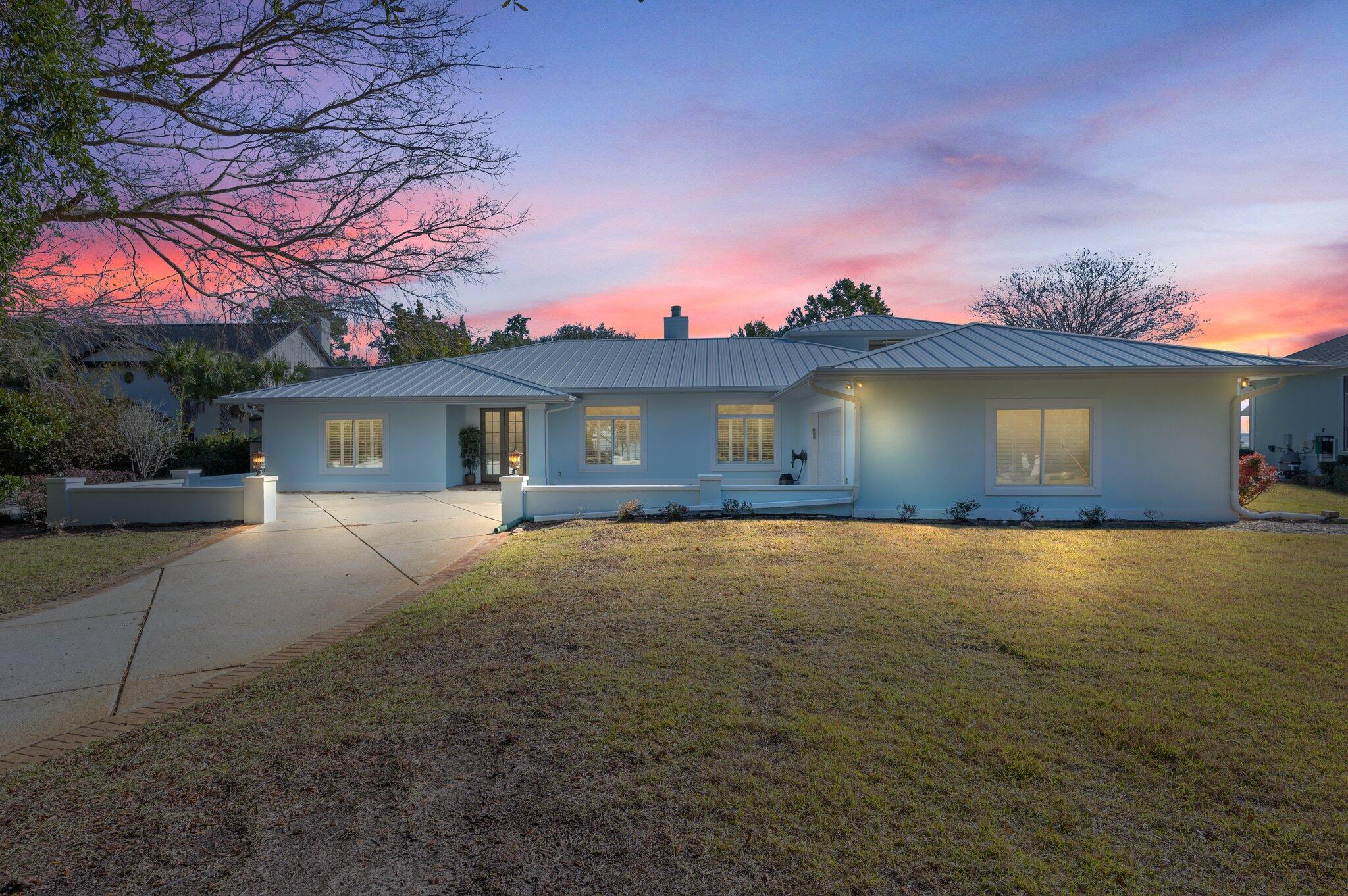 Waterfront Paradise Awaits! Breathtaking Easterly bay views. ''Crows Nest'' office w/ panoramic vistas. Gourmet kitchen w/ top-of-the-line appliances & quartz counters.  Screened pool and 12' telescoping patio doors for bringing the outdoors in!  A spacious primary suite and 2nd office. 2021 metal roof, hurricane shutters and 300-foot pier with sitting area.  This home should not be missed!