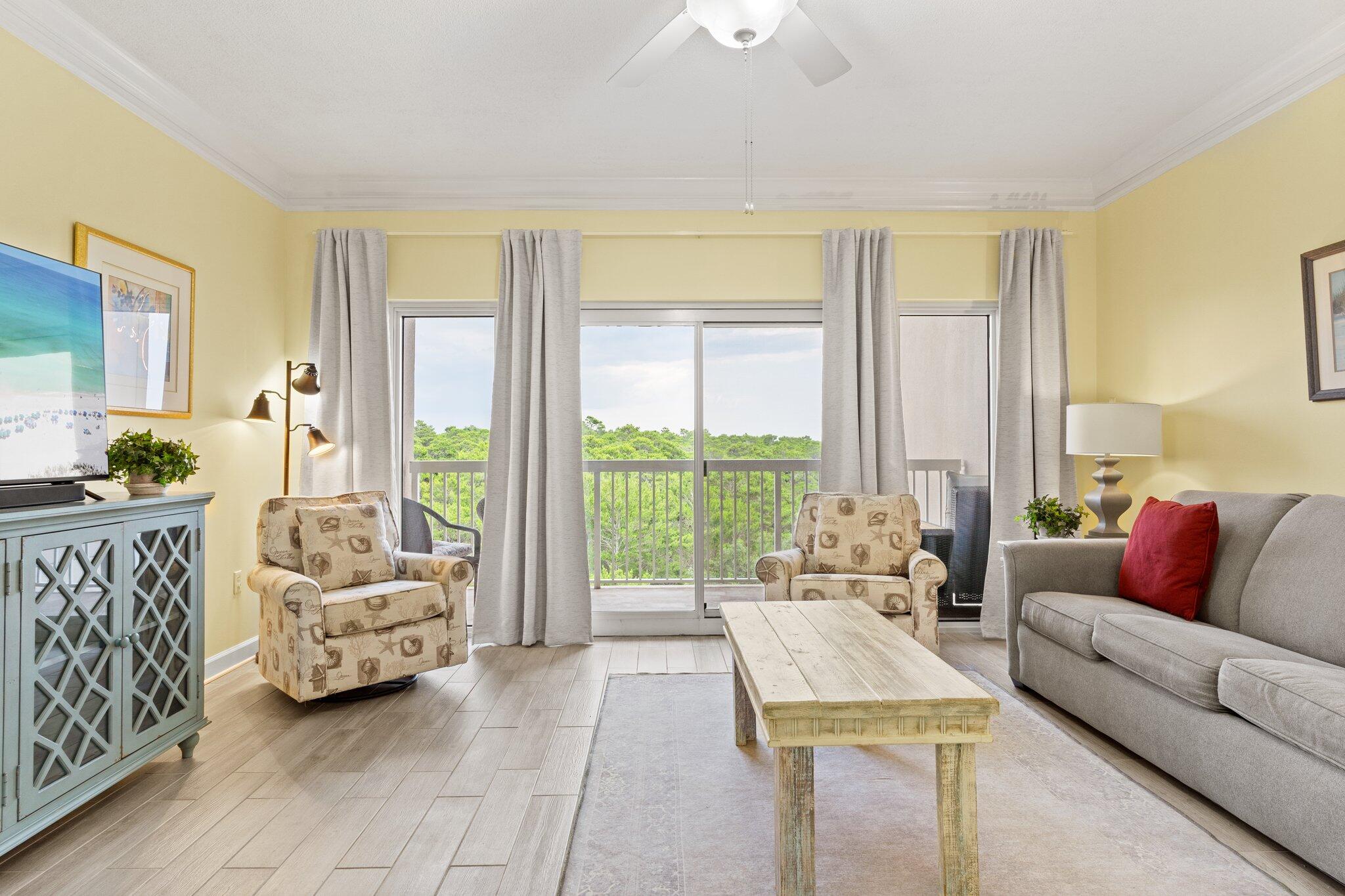 Completely renovated with new furnishings and finishes, this coastal chic 2BR/2BA condo is located on the east wing of the Summit at Tops'l Beach and Racquet Resort. This is truly a dream vacation condo! With views of the nature preserve from the living room and master bedroom, you will enjoy a quiet location just a short 200 yard stroll to the sugar white Tops'l beach, and the pool is just downstairs.