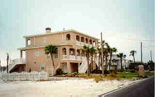Fabulous 4BR/4.5BA home located on deep water canal on Holiday Isle.  Spacious bedrooms feature two-way fireplaces, balcony and views! Will accommodate large yacht. Holiday Isle features two private beach access points along Gulfshore Drive.