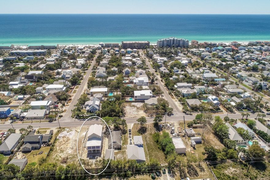 Excellent opportunity to enjoy new construction set amongst the backdrop of the white sand beaches and emerald green waters of the Emerald Coast. This extraordinary eight bedroom home is offered mid construction with ample opportunity to acquire before peak rental season offering +$200,000 in gross annual rental projections with an estimated completion date of early Summer 2019. Thoughtfully designed and masterfully built, this beautiful beachside retreat spans three vertical stories and is highlighted by it's coastal architectural aesthetic utilizing low maintenance, sustainable building products including hardi-plank siding and metal roofing. The open floorplan is beautifully designed with ample room for entertainment anchored