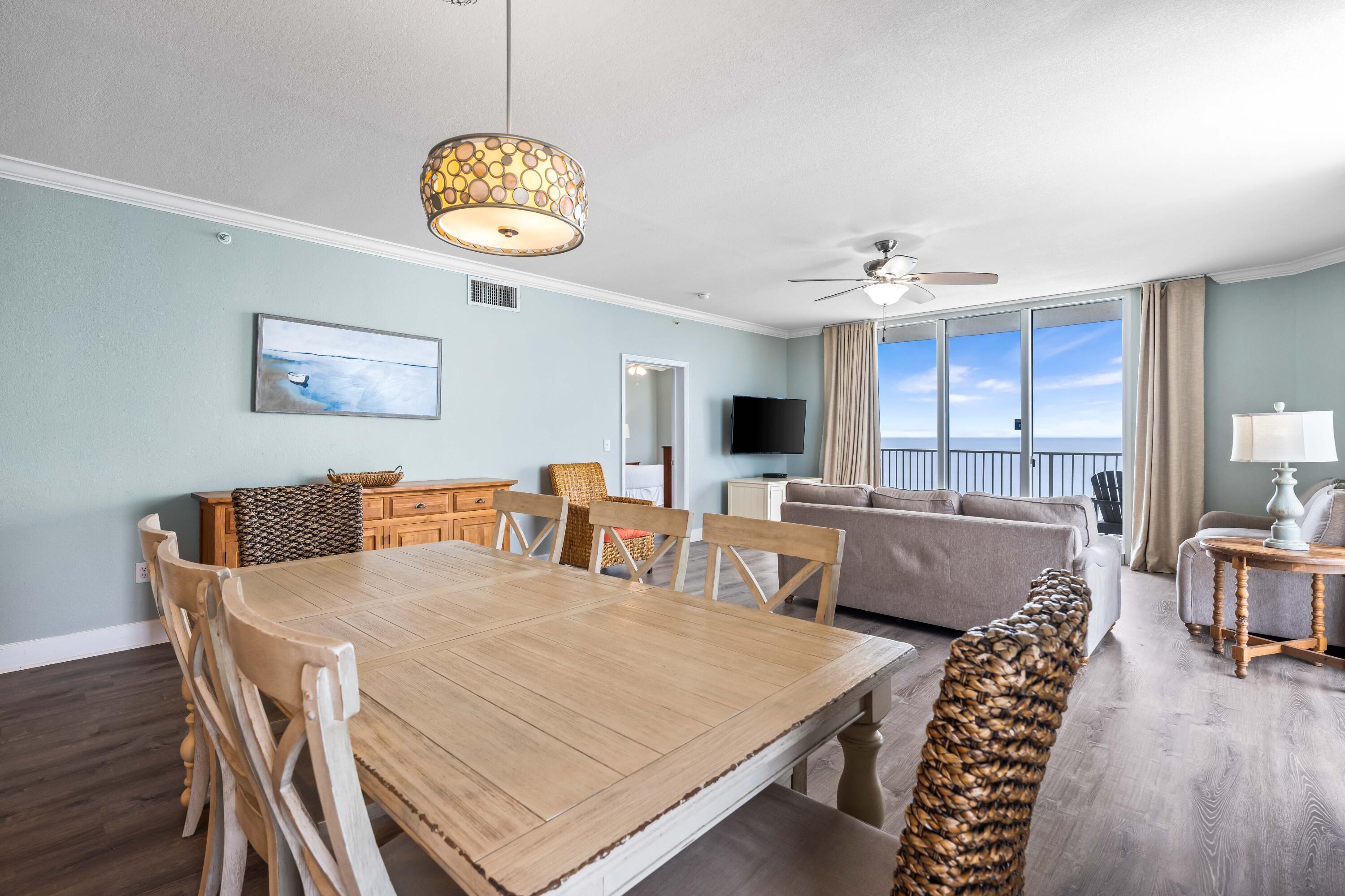 This 3 bedroom, 3 bath unit is situated perfectly on the western corner of Tidewater Beach Resort in Panama City Beach. The resort sits directly on the beach with expansive views of the Gulf's pristine beaches, it offers almost 2,300 sq.ft of living space. The three large bedrooms include a beachfront master with balcony access, and a bonus 4th space configured as a bunk room serving as an additional bedroom. The oversized kitchen seamlessly connects to the living and dining area, featuring new stainless appliances, granite countertops, enhanced lighting, and ample seating at the breakfast bar. The wraparound balcony is a highlight, ensuring you never miss a sunset in this coastal paradise. Rental ready with a great history! Tidewater Beach Resort has impressive amenities: two 4,200 square foot outdoor lagoon pools with hot tubs, a heated indoor pool, a state-of-the-art fitness center with Roman Spa, steam room and sauna, theater-style movie/media center, arcade/game room, restaurant, coffee shop and tiki bar. Best of all, Tidewater Beach Resort is just a quick walk or bike ride away from City Pier (great for fishing and marine life watching) and Pier Park, the new entertainment, shopping and dining hub of West Panama City Beach and beyond!