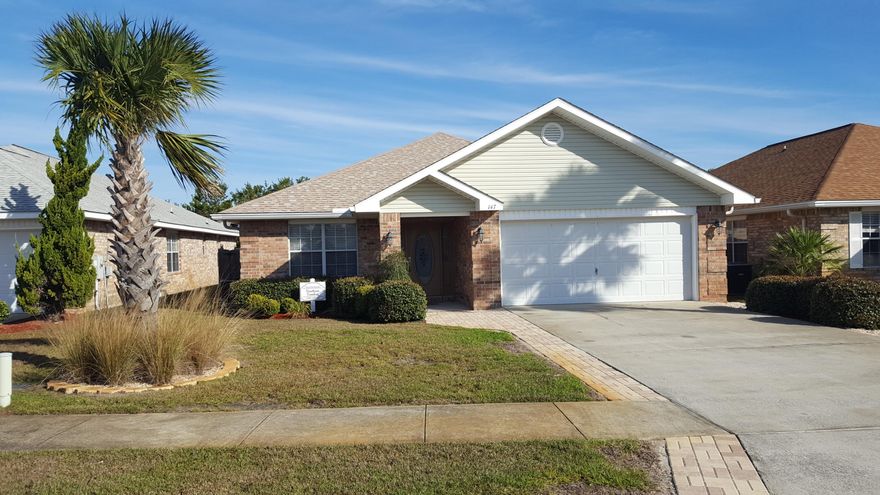 Beachside Gated Community with 2 Deeded BEACH ACCESSES to 300 feet of private beach. Enjoy a lifestyle 880yd from the white sand beaches & beautiful emerald waters. Community south of Highway 98 has unique North & South Entrance Gates. This lovely all brick home with 4 bedroom, 2 baths features large bedrooms plan. The rear master with walk-in closets, ensuite equipped with dual vanity, large shower and separate tub, private toilet. Open floor plan has vaulted ceilings over formal dining and living rooms,laminate flooring throughout, tile kitchen floor and granite counter tops, breakfast bar. Stainless Steel Double Sink, Fridge, Dishwasher, Microwave, & Electric Range. The back door opens to a covered screened concrete patio with Spa, exit to pool & pavers, landscaped fenced in yard.