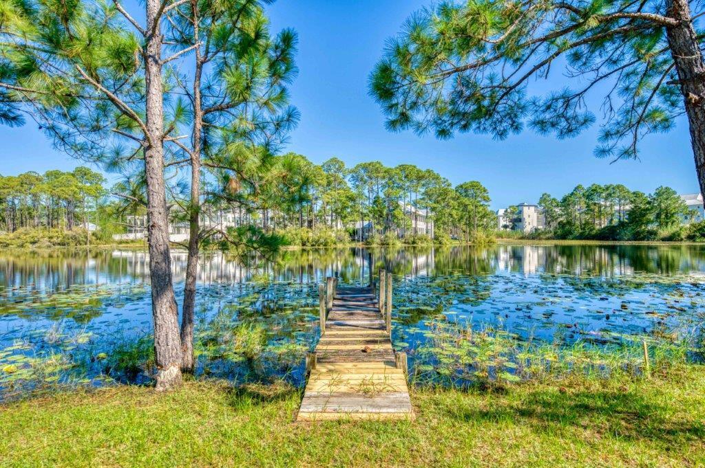 You will find 211 Lakeview in Old Seagrove that special place which slowly matured from a small beach village to the thriving sophisticated retreat it is today. This bright beach blue cottage has made memories for this South Georgia family since the sixties. The family found this perfect spot on one of the local coastal ponds just steps from our beautiful gulf waters and the white shimmering sands of the beach. Seagrove and 30A grew up around it while it provided an escape for all who visited. Lots are few and far between south of 30A this close to the beach. The property is situated between 2 walkable public beach accesses, and yet close to all that makes Seagrove special. It is your turn now....