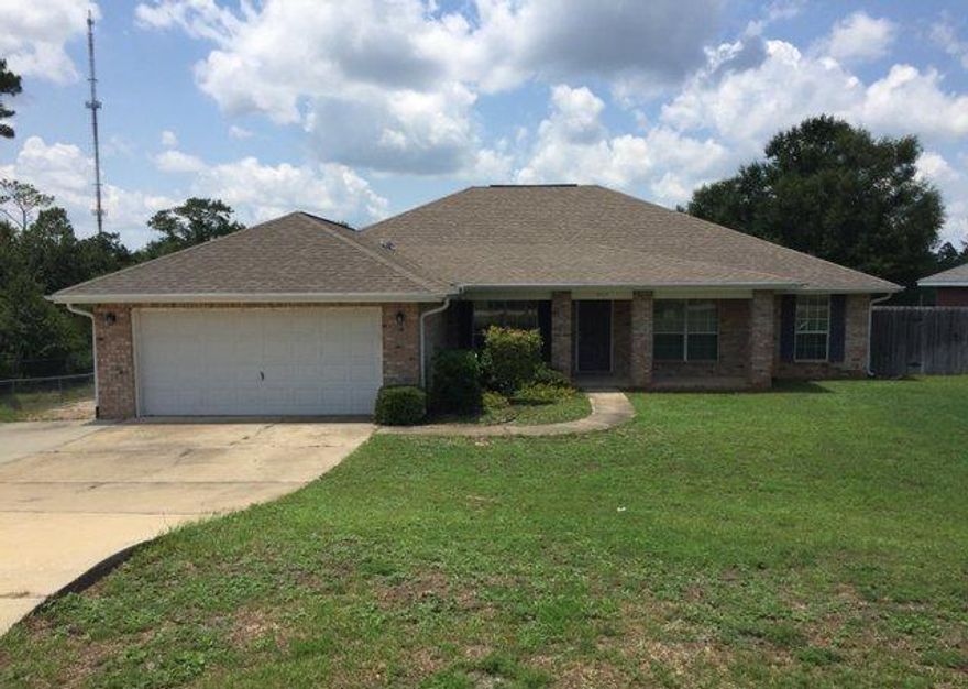 REO ~ This spacious 4 Bd / 2 Ba home is move in ready with fresh paint & new carpet. The home offers an eat-in kitchen with breakfast bar, formal dining room & living room. The family room features a fireplace & access to the large fenced backyard. All brick home! Don't miss out on all this home has to offer. Prior to seller receipt and approval of the full title package from foreclosure, title to the property will be conveyed by a quit claim deed.