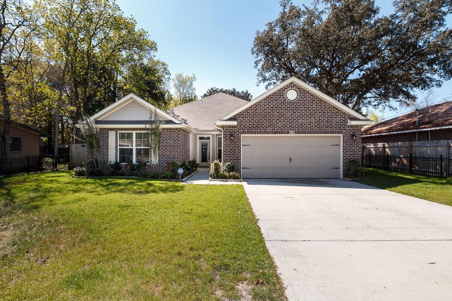 BACK ON THE MARKET @ NO FAULT OF THE SELLERS. *LIKE NEW*This well appointed home is truly move-in ready! Property is perfectly located, minutes to the white sandy beaches and situated 5 miles from Eglin AFB and Hurlburt Filed. Immaculate kitchen features countertop bar with extra seating, granite countertops, upgraded cabinetry with soft close drawers, and stainless appliances. Crown molding accents the beautiful trayed ceiling living room, along with deluxe baseboard trim throughout. All bedrooms are spacious and have ample closet space.Master bath features garden soaking tub with tile backsplash, dual vanities w/marble countertops, and a tiled walk-in shower. Exterior is meticulously maintained and front yard is fully enclosed with decorative metal fencing, truly maximizing the lawn spac