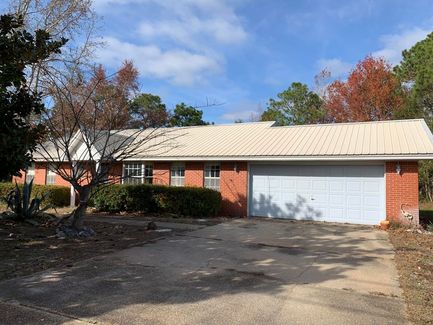 Brick Home with .5 acre lot in HBTS! Backyard fully fenced with lots of acreage to have a garden, pool, or shed;  Florida Room, which is heated and cooled adds 300 more feet of Living space for entertaining enjoyment! Master Bath has cultured marble tub with whirlpool; SPACIOUS KITCHEN has everything you need to entertain and has lots of cabinet space; Office can be True office or Bedroom if one adds a chifferobe wardrobe;  Owner enjoys the benefits of Holley By the Sea recreation center with three pools, gym, tennis courts, meeting rooms, and club activities;