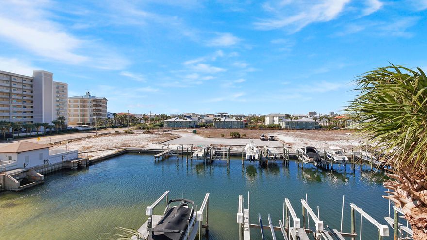 This completely renovated and immaculate 2 bed 2 bath waterfront condo in the desirable Harbor Landing on Holiday Isle a must see! Located in the heart of Destin near shopping, restaurants, activities, and more, even a water taxi can pick you up right there at the Harbor Landing dock and take you to the Destin Harbor or Crab Island! Starting in May you can sit on the balcony and watch the fireworks and airplane shows. This lovely unit is literally brand new from the studs in; HVAC was recently replaced, gorgeous floating wood flooring, granite countertops, new appliances, new vanities, new cabinets and even the doorknobs, hardware and more!  Boasting fantastic waterfront views, this home is completely turnkey and would make a fantastic second home or rental property.  Call me today! Short term rental projections approx. $56-$65K annually. Residents enjoy deeded beach access, gated security with cameras throughout, 2 tropical swimming pools with hot tubs (one of each is for owners only), a fitness room and a grilling area. A deeded assigned garage parking spot and an owner storage room (8x5) convey with the unit.
