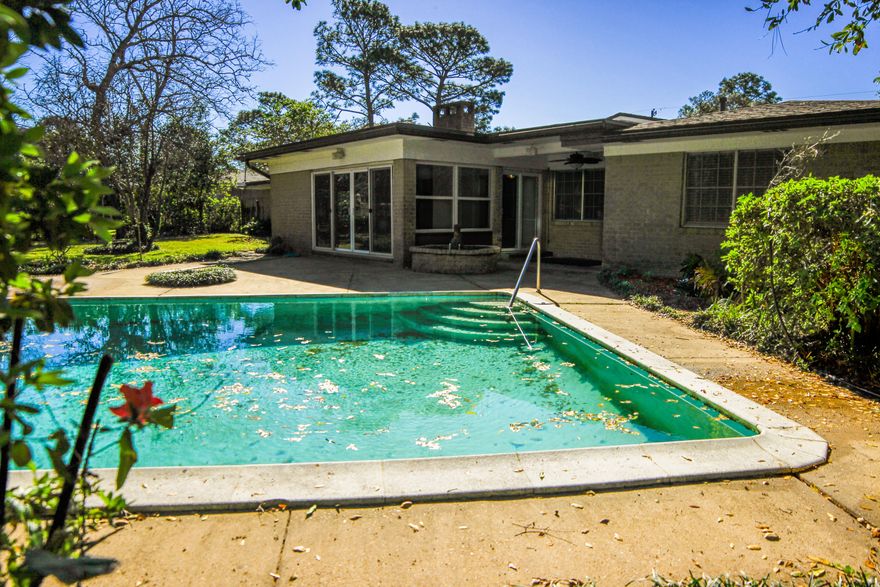 4 BEDROOM with GUNITE POOL IN KENWOOD!!2014 Roof, 2012 AC, COPPER WIRING, GAS HOT WATER HEATER!!You will love the space in this nearly 2300 sqft BRICK home. NEED RV OR BOAT SPACE? The extended driveway leading to a fully finished oversized garage along with the .35 acre lot will fit all your outside needs. Interior features include oversized windows for great natural lighting throughout. Sunlit living room & lovely dining area with gas fireplace conveniently open to the kitchen. Great room with full surrounding windows & views of your oversized back yard, patio and gunite pool. (Pictures show set up as a gym) Laundry room extends off kitchen with access to the garage conveniently with plenty of room for storage and mud room design. All 4 Bedrooms sit off to the west of the home. New hardwood floors through living room and hallway. Great room has woodgrain tile & bedroom carpet  is 2 years new. Kenwood is a Bayfront community & offers the most desirable sidewalk neighborhood in Fort Walton Beach with great schools, convenient access to both bases, hospital, shopping and beaches! Call to see today, will not last long! 