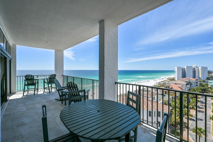 A Jill Doughty design, this gulf-front three-bedroom residence sprawling half of the ninth floor is the epitome of private coastal living. Inspired by the endless horizon and the promise it carries, the recent remodel encompasses an open-concept and a modern-sophisticated flair. Upon initial entry, the grand vestibule leads the way to the foyer showcasing 10' ceilings, aged Oak hardwood flooring, and countless premium finishes that are carried throughout.The expansive main living and dining areas offers sweeping 180-degree views of the turquoise hued waters effectively blurring the line between indoors and out. The gourmet kitchen encompasses custom cabinetry, dual kitchen islands, quartz countertops, and a luxury appliance suite.