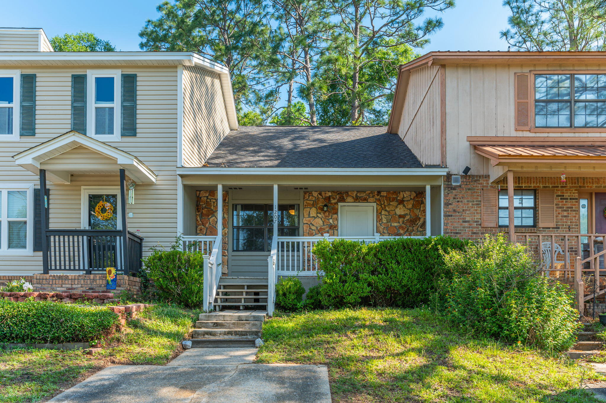 Town home in the heart of Crestview featuring a covered front and back porch, high cathedral ceiling in the living room, eat-in kitchen, indoor laundry room, and storage closet. Spacious owners suite upstairs as well as guest suite on the ground level. Light airy and perfect for first time home buyers! And best of all...NO HOA!!!