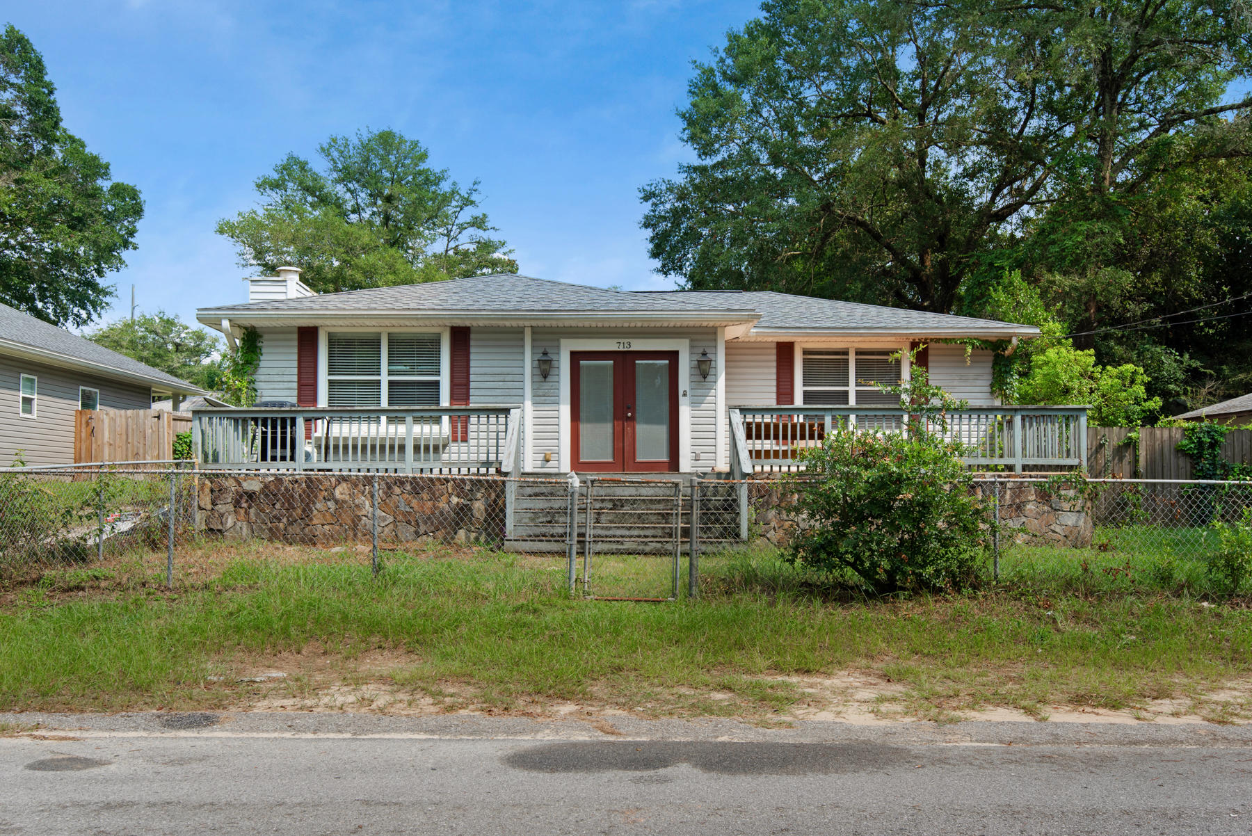 Needs some love but a great home! Stainless steel appliances, modern kitchen- tile backsplash, granite counters, neutral colors, wood flooring, one bedroom brand new carpet, paint, etc (tree fell last year during hurricane) New ROOF finished last year. All new electrical. All new HVAC including ducts. Nice stone fireplace in living room. Warranties convey on all new work that was done. Exterminator treatment recently done (July 2021) Seller has had a recent inspection done (July 2021) which can convey. Foundation has been inspected and needs steel support beams in kitchen and living room, bid was $5,000. Bid/inspection to be shared with buyer. In ground vinyl pool, needs to be replaced. Big workshop/garage in back. Lots of potential!
