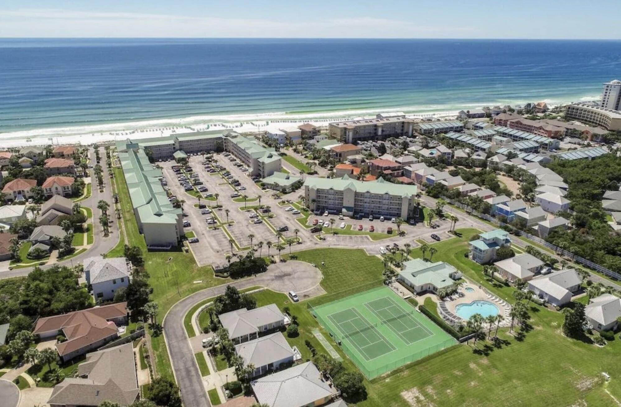 This ground floor unit is a rental machine. Maravilla continues to be the most popular family and pet friendly community along Scenic Gulf Drive. This 33 acre community has gated access from US 98 and Scenic Gulf Drive, deeded beach access to 500 feet of private beach with beach service from early March through October, four condo buildings of 189 units, 60 cottages, and 10 Shores Homes of 2-3 story height. Amenities include two tennis/pickle ball courts, community club house with fitness room, kitchen, and association manager, conference room, two pools with one seasonally heated, hot tub, basketball court, beach volleyball, and acres of green space and sidewalks for guest to enjoy. Currently open to show until May 5th.