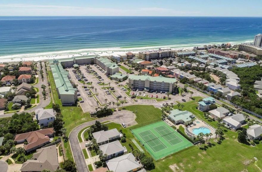 This ground floor unit is a rental machine.  Maravilla continues to be the most popular family and pet friendly community along Scenic Gulf Drive.  This 33 acre community has gated access from US 98 and Scenic Gulf Drive, deeded beach access to 500 feet of private beach with beach service from early March through October, four condo buildings of 189 units, 60 cottages, and 10 Shores Homes of 2-3 story height.  Amenities include two tennis/pickle ball courts, community club house with fitness room, kitchen, and association manager, conference room, two pools with one seasonally heated, hot tub, basketball court, beach volleyball, and acres of green space and sidewalks for guest to enjoy. Currently open to show until May 5th.