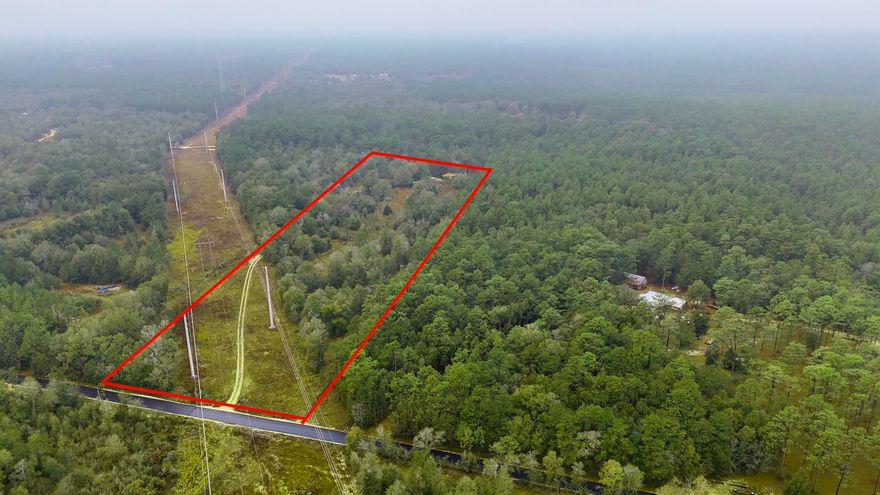 Ready to build your dream home or the perfect hunting camp?  This 10-acre property in Holt, FL, is perfect for you! Located minutes from Bryant bridge, across the street from Blackwater State Forest and a short ride to boat and kayak launches.  Kelly Mill Rd is all smooth blacktop so no wear and tear on your vehicle. Power is already run to the property, water and septic are on site as well. Cabin on the property has been used as a tack room/apartment and is AS-IS. It's a little piece of Florida, just for you! Buyer to verify all pertinent information.