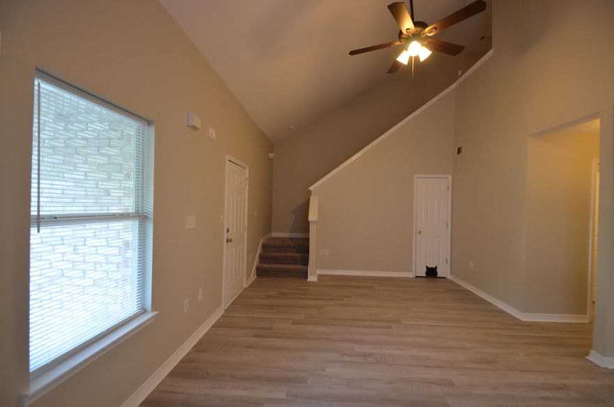Great location in East Navarre, just a few miles from Navarre Beach, shopping, restaurants and more! Updated townhome with new LVP flooring in living area, new carpet in stairs and bedrooms, freshly painted. Stainless steel appliances. It also has one car garage and spacious driveway for guest or extra vehicles. Washer and dryer convey 'AS IS' New HVAC system installed in May 2021. A new roof will be installed with an acceptable offer.  There are no rental time frame restrictions.Call today to schedule a showing!