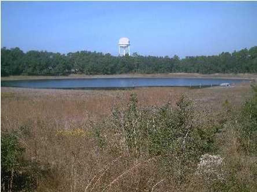 Excellent waterfront lot on Pretty Pond. Great investment or build your own home. Water and electricity are nearby, septic system would be needed. Peaceful. Mobile homes allowed. Listed dimensions are approximated from plat. Buyer to verify information important to buyer.
